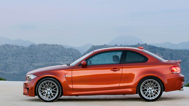 Side Pose of 2011 BMW 1 Series M Near Moutains